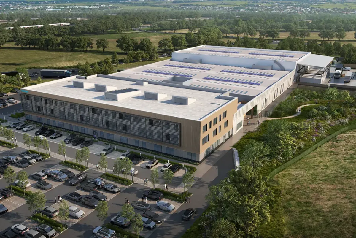 A large building with a parking lot.