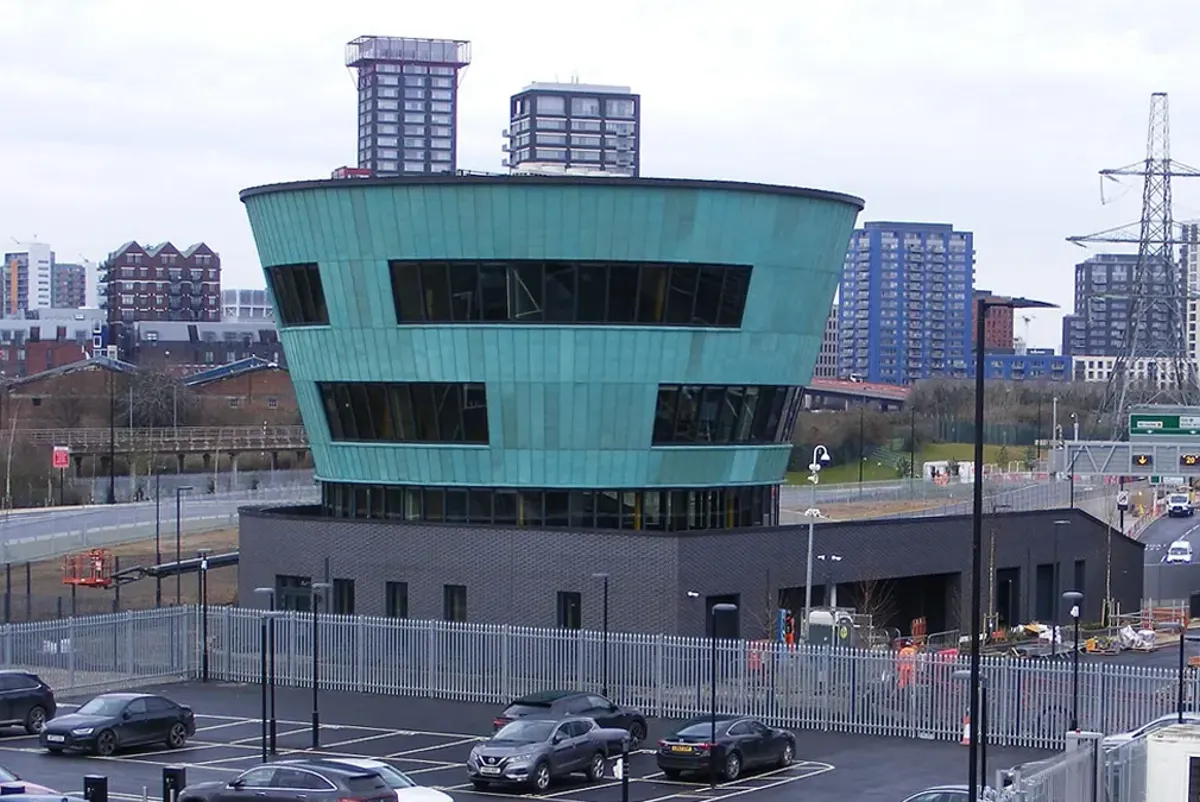 A large building with a blue roof.