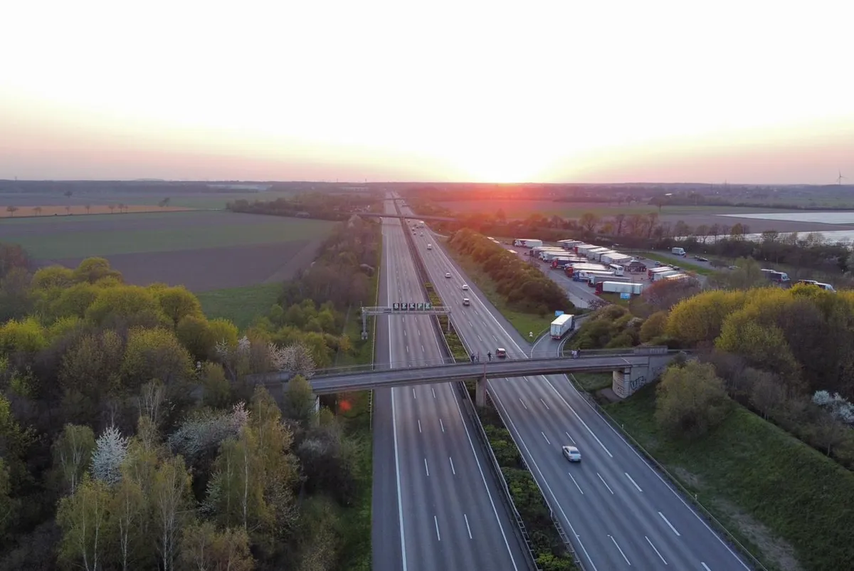 A highway with many cars on it.