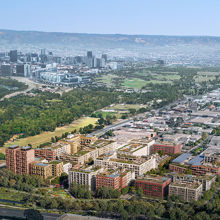 Artist impression of precinct block of buildings surrounded by parklands