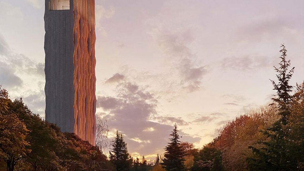 A tall building with trees around it.