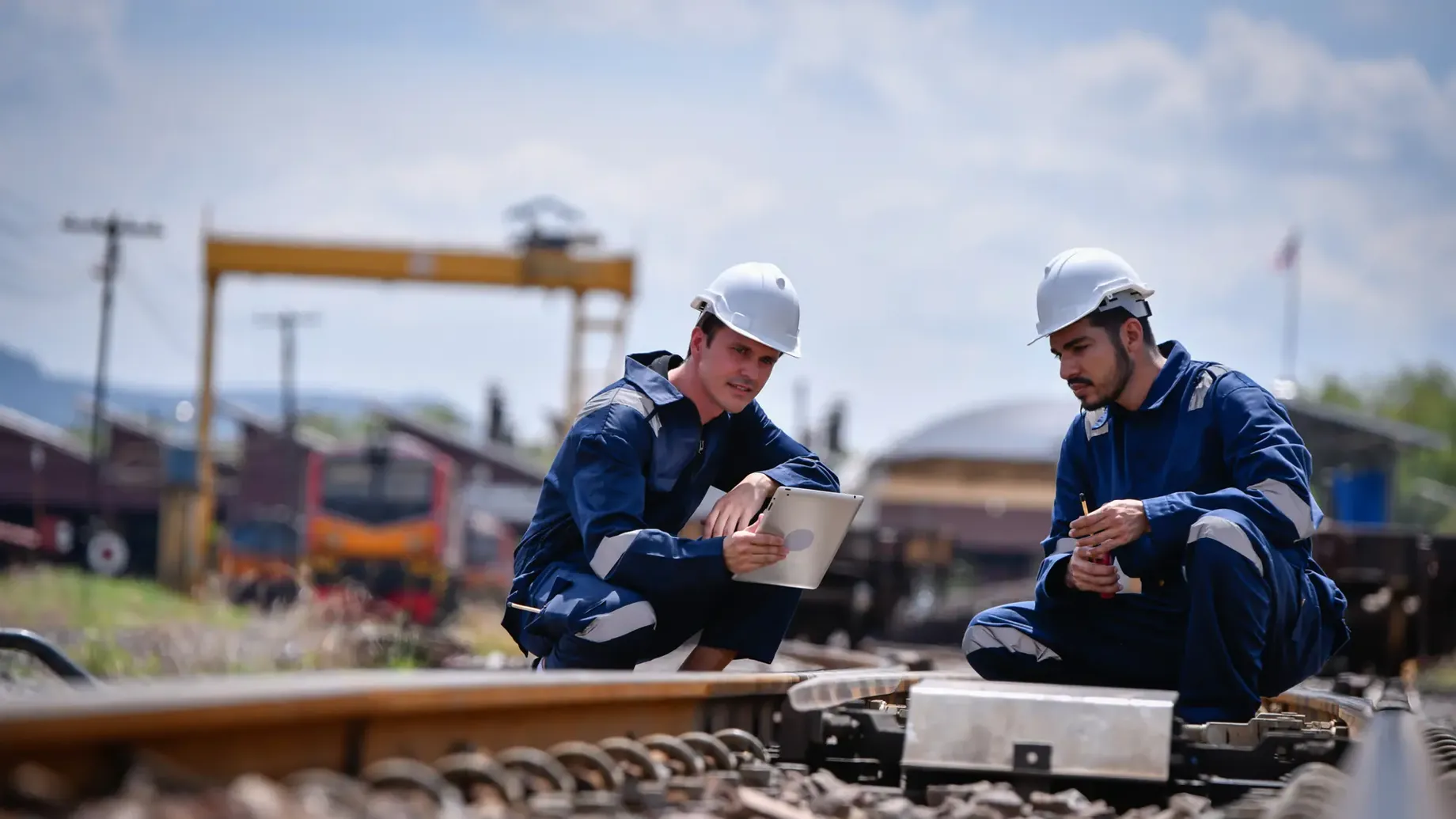Engineers working on a railway construction site
