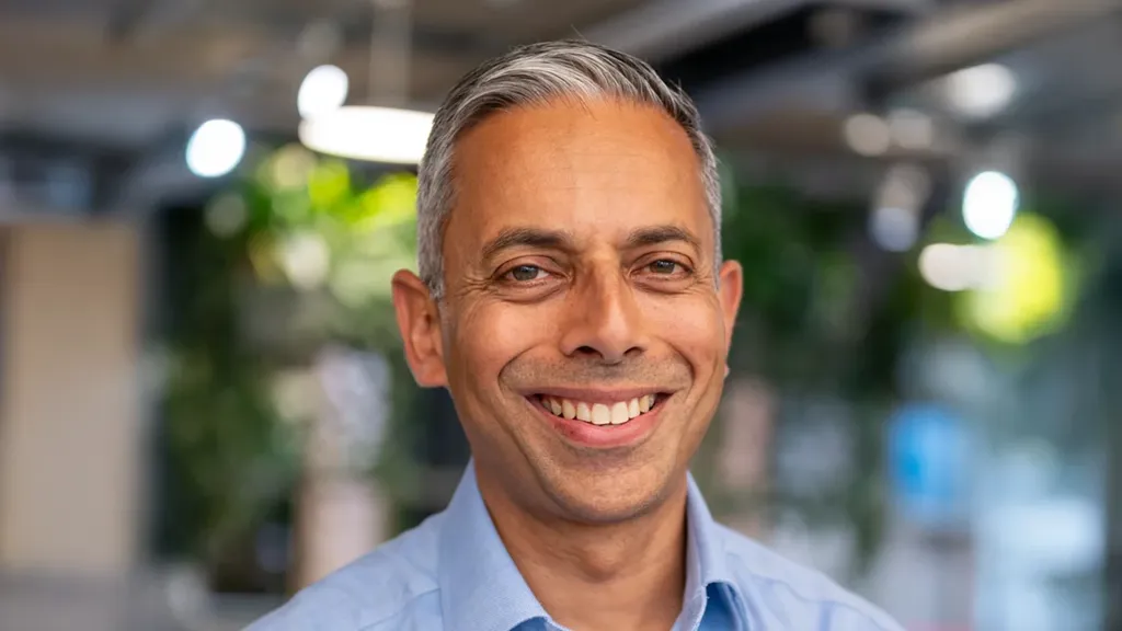 A man smiling for the camera.