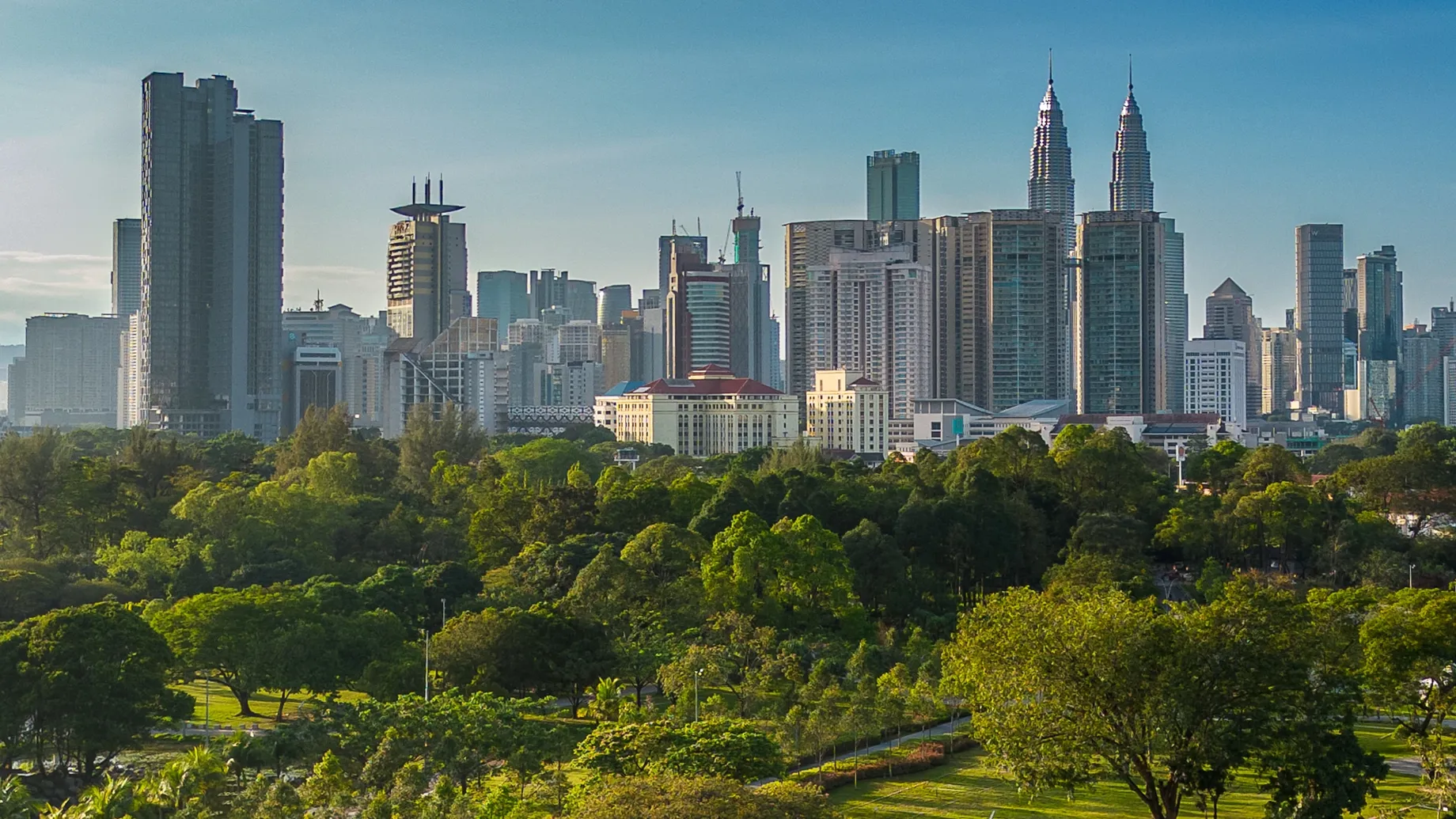 A city with many trees and buildings.